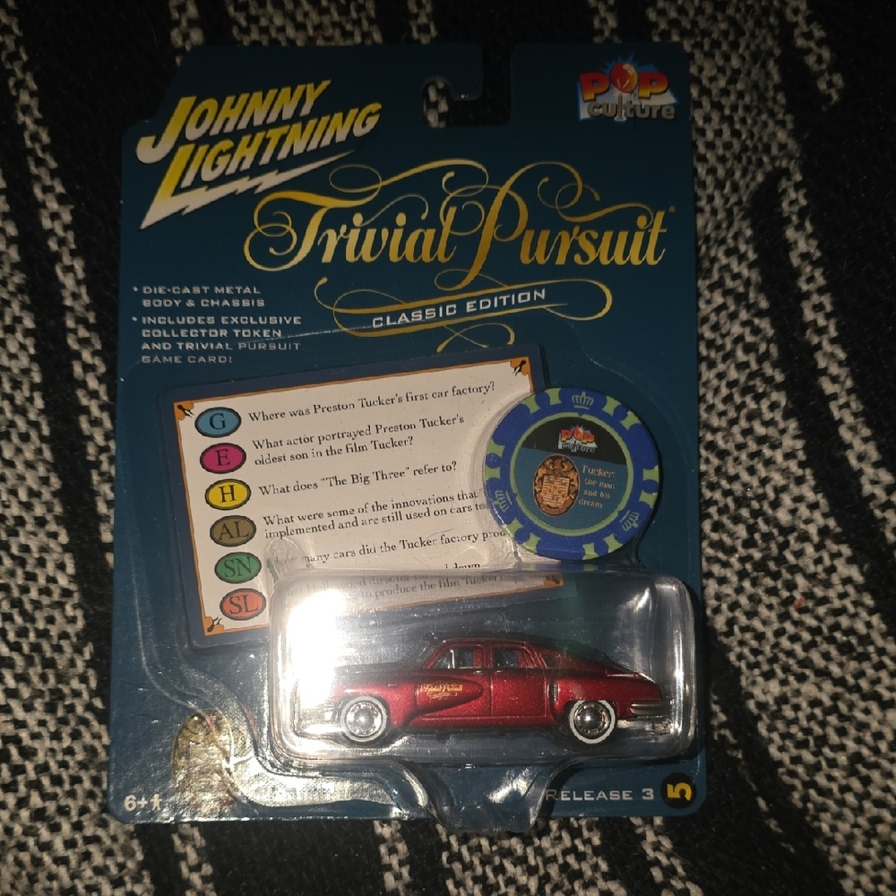 Johnny Lightning Red Die-Cast Car - Trivial Pursuit Edition
